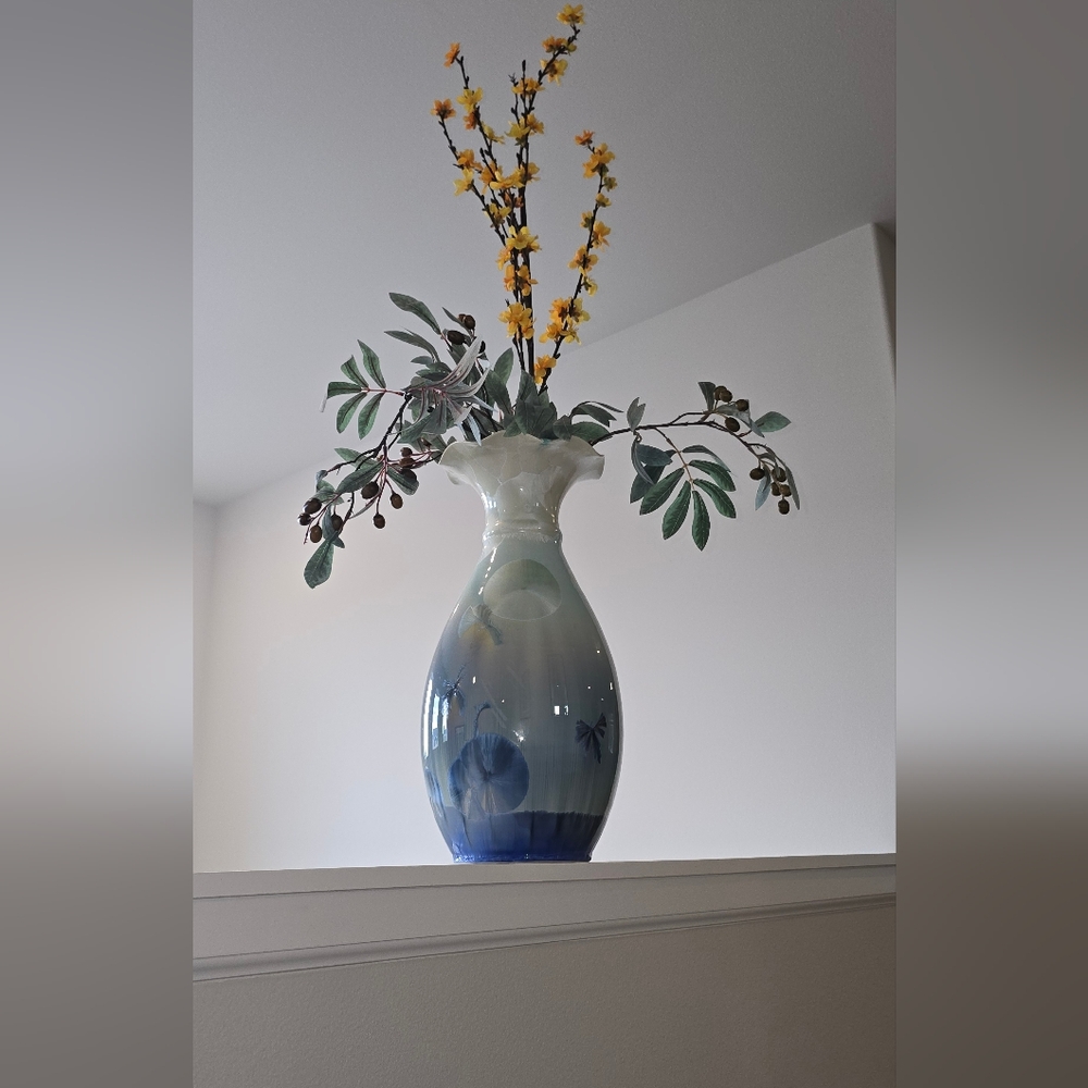 Elegant Blue and White Vase with Floral Design